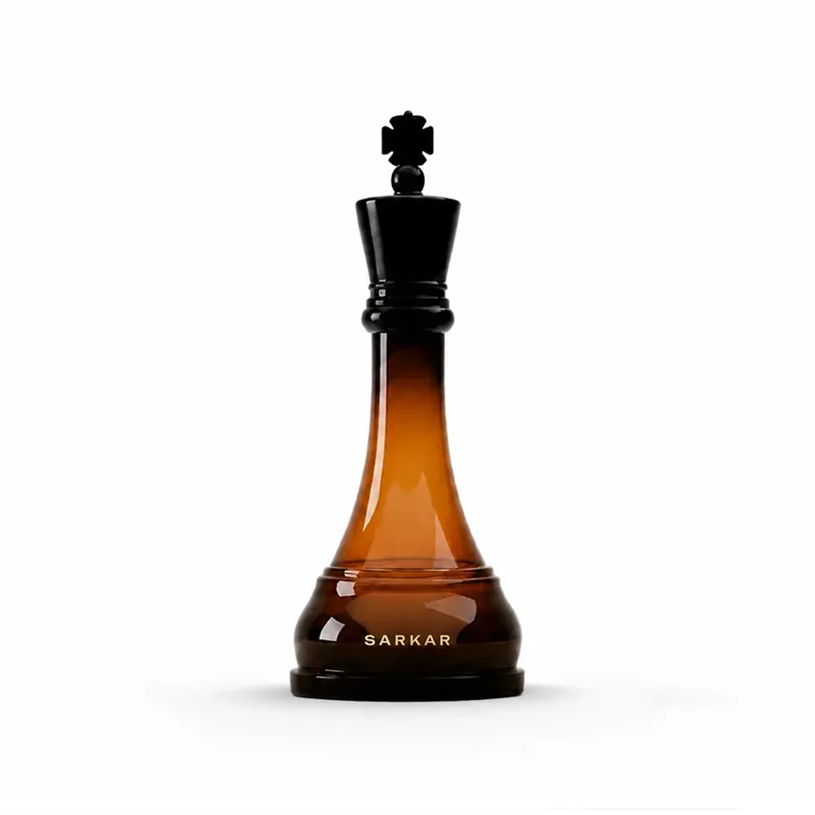 Sarkar Noor chess-king shaped amber perfume bottle with black cap