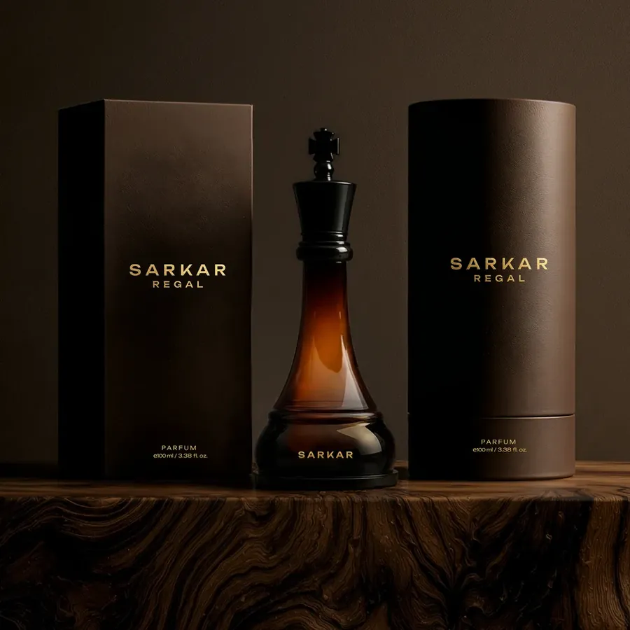 Sarkar Regal parfum bottle beside its brown gift box and cylindrical tube packaging